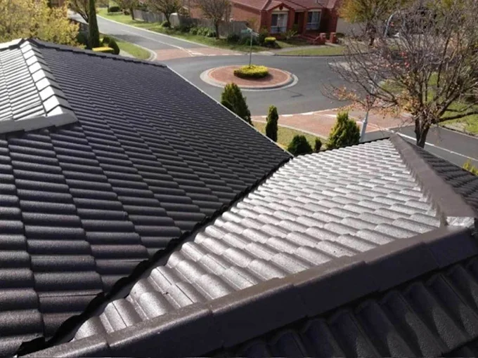 Restored tiled roof on a residential property in Heidelberg, featuring freshly sealed tiles and neat ridge lines.